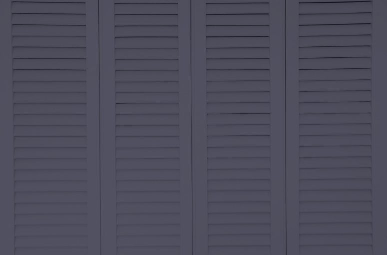 Plantation style white window sun shutters. Background concept. Plantation Shutters Ocoee